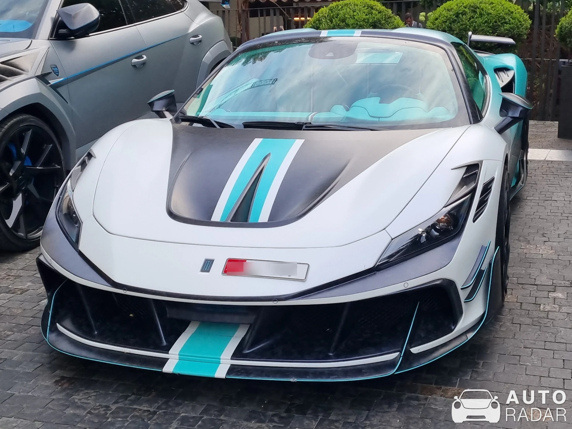 Ferrari F8 Spider Mansory F8XX Tempesta Turchese spotted in Milan